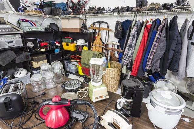 What is the difference between clutter and hoarding and what is the impact on the elderly?